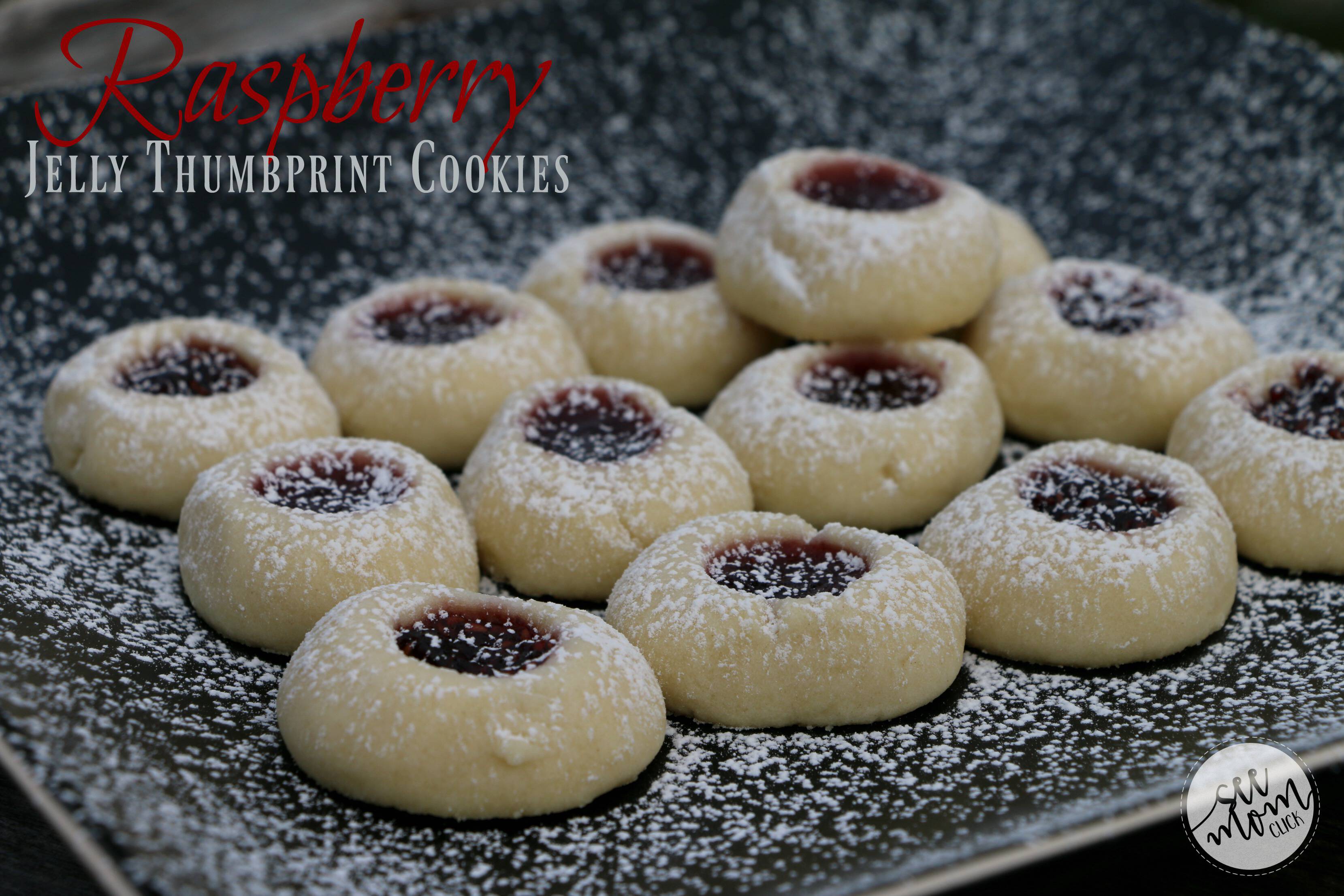 This Raspberry Jelly Thumbprint Cookie Recipe is a family tradition for me. My Mom has made these Christmas cookies every year since I was a kid. They're easy and delicious! And that pretty red filling makes them perfect for Valentine's Day, too!