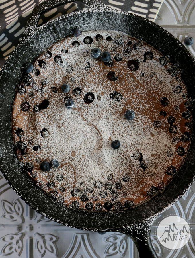 This Skillet Chocolate Blueberry Pancake is so easy to make and doubles as breakfast AND dessert. One of my new go-to cast iron skillet recipes!